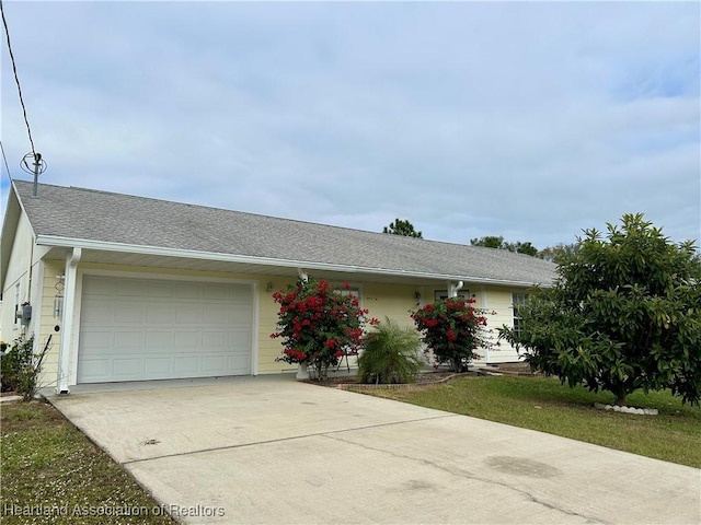 single story home with a garage