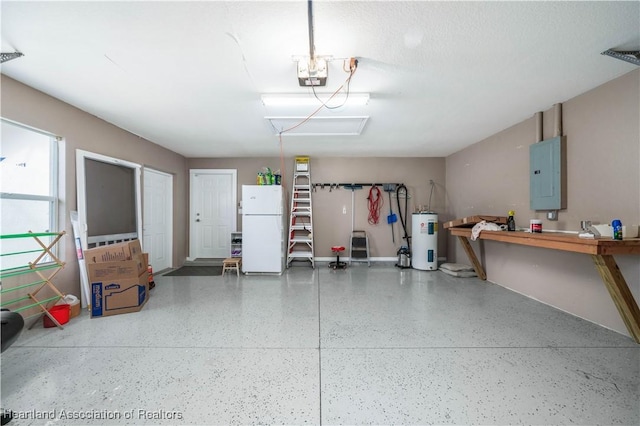 garage featuring electric panel, electric water heater, white fridge, and a garage door opener