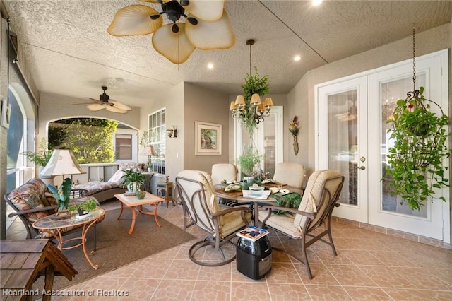 view of patio / terrace with ceiling fan and french doors