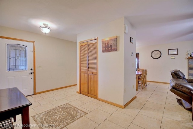 2211 Pinewood Blvd, Sebring, FL 33870 - foyer with light tile patterned floors and baseboards