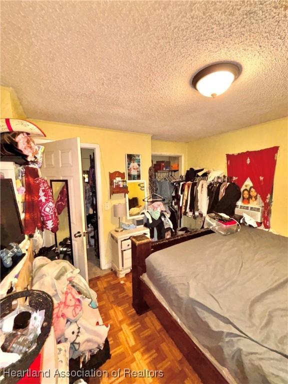 205 E Townsend St, Wauchula, FL 33873 - bedroom with a textured ceiling