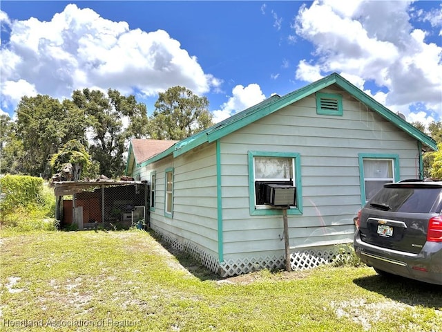 205 E Townsend St, Wauchula, FL 33873 - view of property exterior with a yard