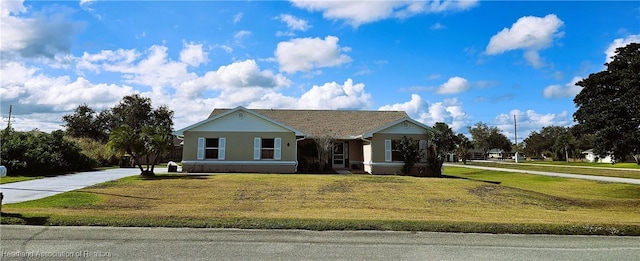 ranch-style house with a front lawn