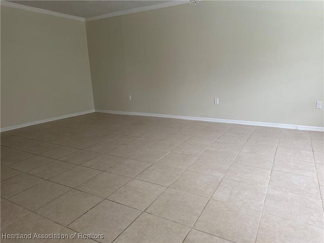 unfurnished room with light tile patterned floors and crown molding