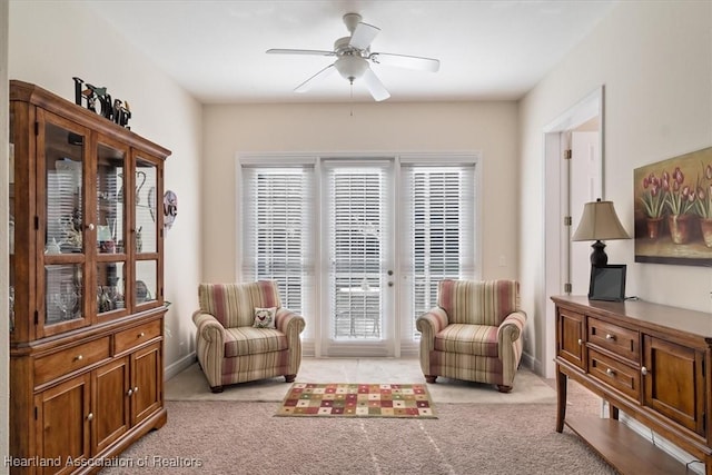 5220 Haw Rd, Sebring, FL 33875 - living area featuring light carpet and a ceiling fan