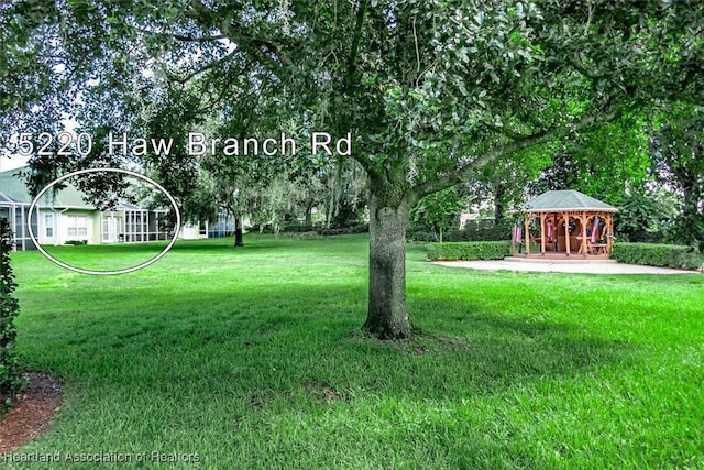 5220 Haw Rd, Sebring, FL 33875 - view of green lawn featuring a gazebo