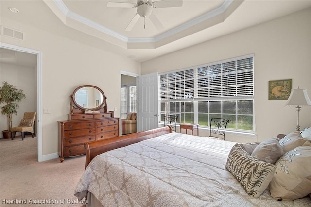 5220 Haw Rd, Sebring, FL 33875 - bedroom with carpet, ornamental molding, a raised ceiling, and a ceiling fan