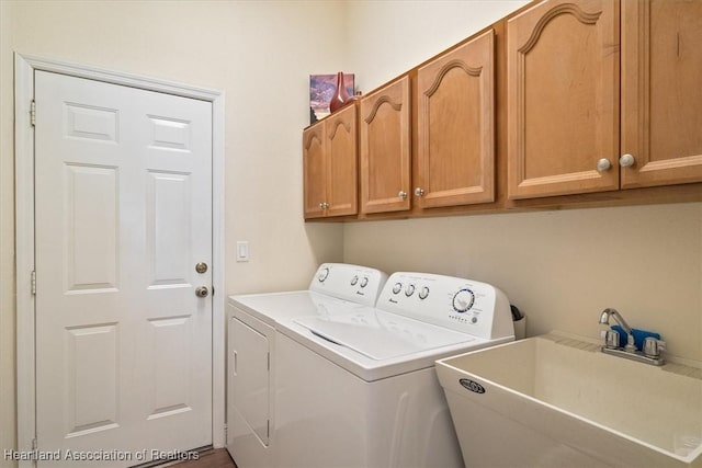 5220 Haw Rd, Sebring, FL 33875 - laundry area with cabinet space and washer and dryer