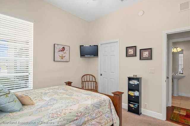 5220 Haw Rd, Sebring, FL 33875 - bedroom with light carpet and baseboards