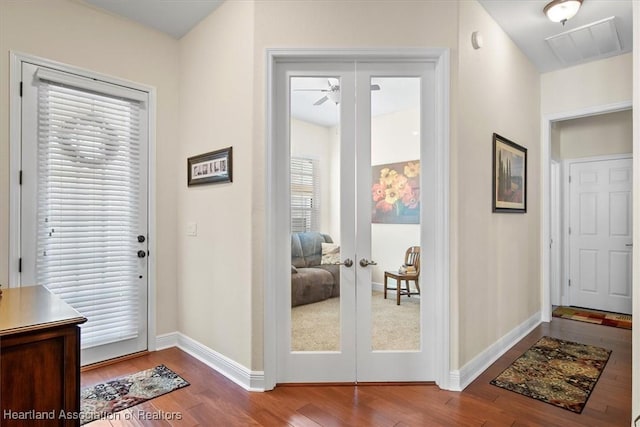 5220 Haw Rd, Sebring, FL 33875 - entrance foyer with wood finished floors, a ceiling fan, and french doors