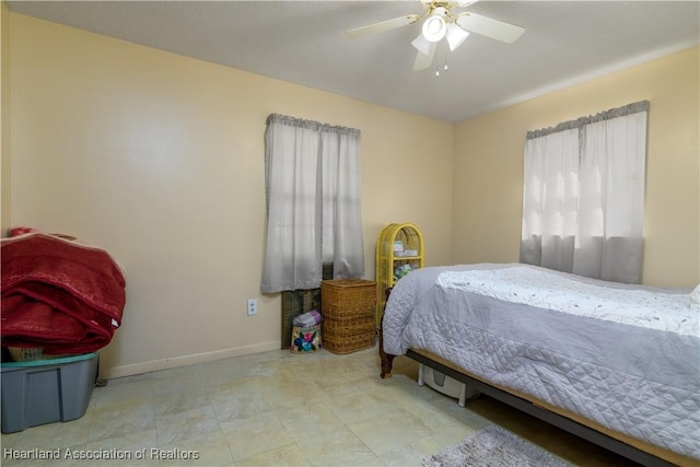 2443 W Newton Rd, Avon Park, FL 33825 - bedroom featuring a ceiling fan and baseboards