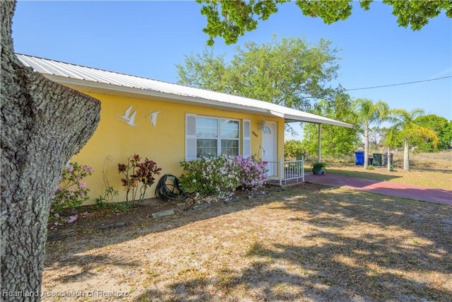 2443 W Newton Rd, Avon Park, FL 33825 - view of front of house with stucco siding