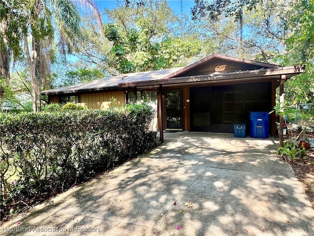 1801 Colmar Ave, Sebring, FL 33870 - view of side of property with concrete driveway