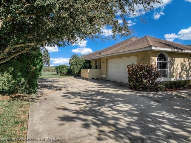 view of home's exterior with a garage