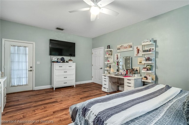 bedroom featuring ceiling fan and dark hardwood / wood-style flooring