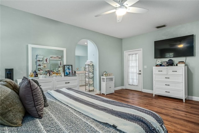 bedroom featuring dark hardwood / wood-style floors and ceiling fan