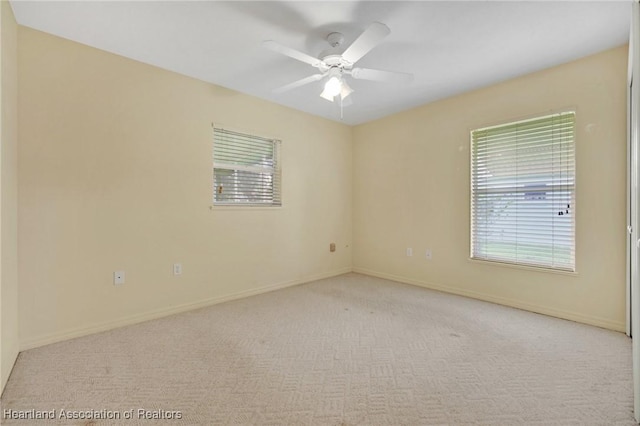 4311 Mandarin Rd, Sebring, FL 33875 - spare room with light colored carpet and ceiling fan