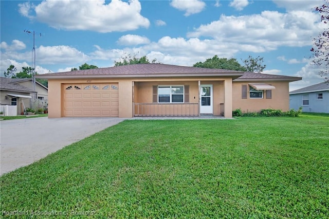 4311 Mandarin Rd, Sebring, FL 33875 - single story home with stucco siding, concrete driveway, a front yard, and an attached garage