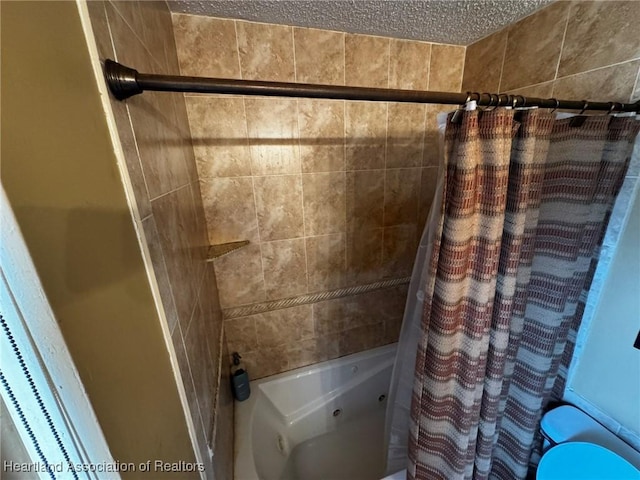 bathroom featuring shower / tub combo with curtain