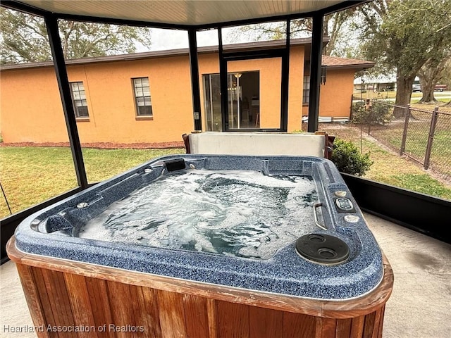 exterior space featuring a jacuzzi