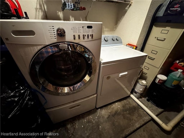 laundry area featuring washing machine and dryer