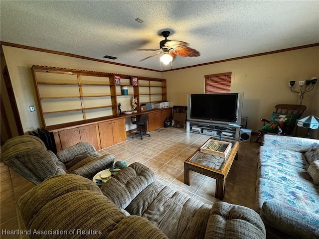 tiled living room featuring crown molding, built in desk, a textured ceiling, and ceiling fan