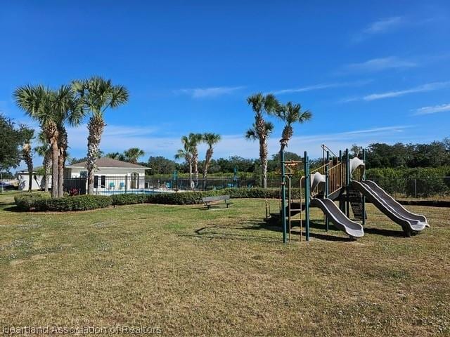 community playground with a lawn
