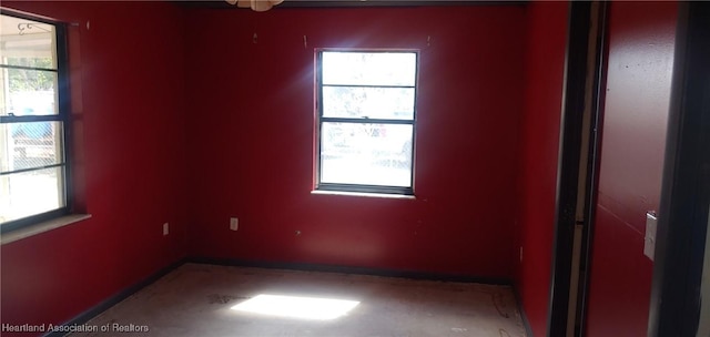 empty room featuring a wealth of natural light