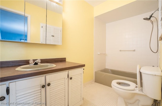 full bath featuring tile patterned flooring, shower / bathtub combination, toilet, and vanity