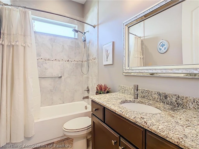 full bathroom featuring tile patterned floors, vanity, toilet, and shower / bathtub combination with curtain