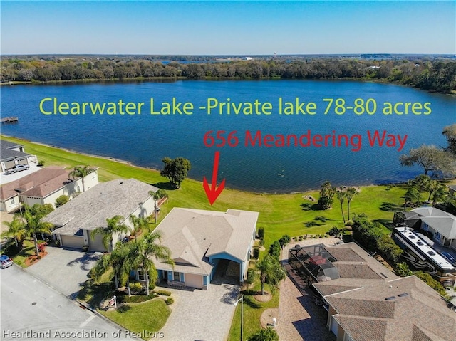 birds eye view of property featuring a water view