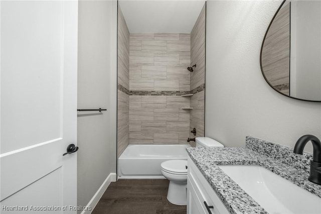 35145 Daily Dr, Sebring, FL 33872 - full bathroom with wood-type flooring, vanity, toilet, and tiled shower / bath