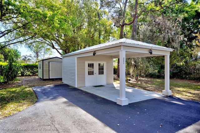 exterior space with a storage unit and an outbuilding