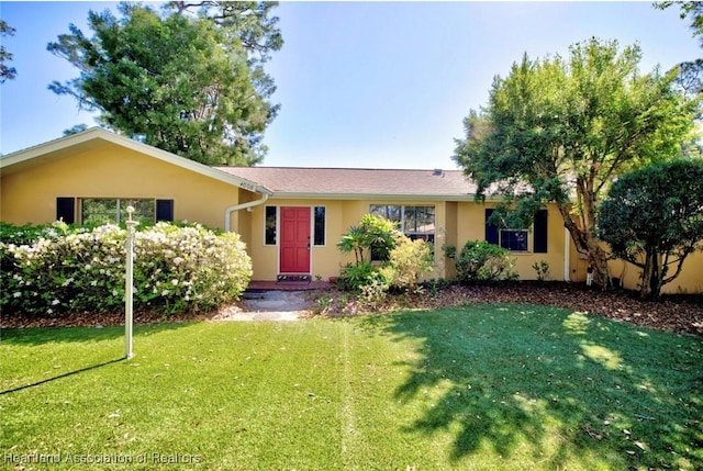 4008 Kearly Ave, Sebring, FL 33875 - ranch-style home featuring stucco siding and a front yard