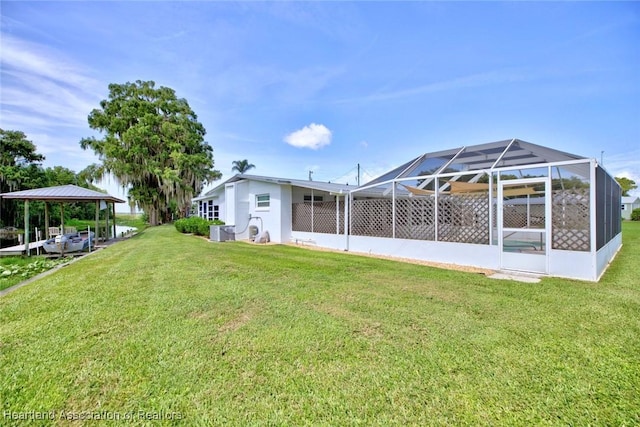 1644 Heron Dr S, Lorida, FL 33857 - view of yard with cooling unit and a lanai