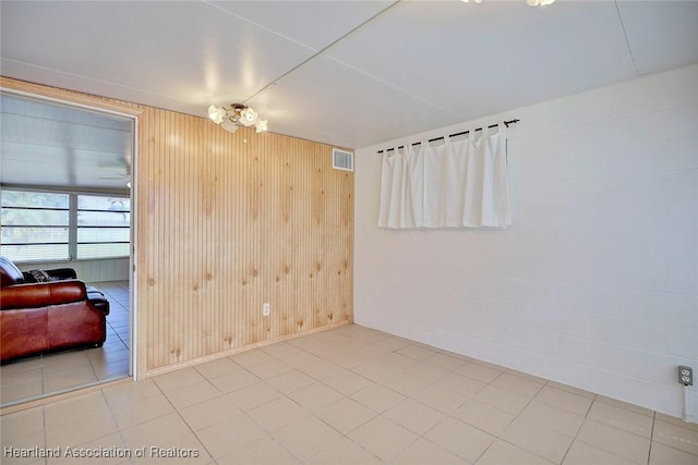 1644 Heron Dr S, Lorida, FL 33857 - unfurnished room featuring wood walls