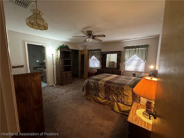 bedroom featuring carpet, visible vents, and ceiling fan