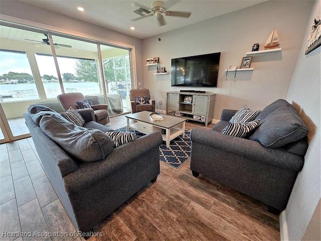 132 Red Water Pt, Lake Placid, FL 33852 - living room featuring a ceiling fan, wood finished floors, and recessed lighting