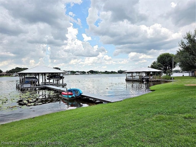 132 Red Water Pt, Lake Placid, FL 33852 - dock featuring a yard, a water view, boat lift, and a gazebo