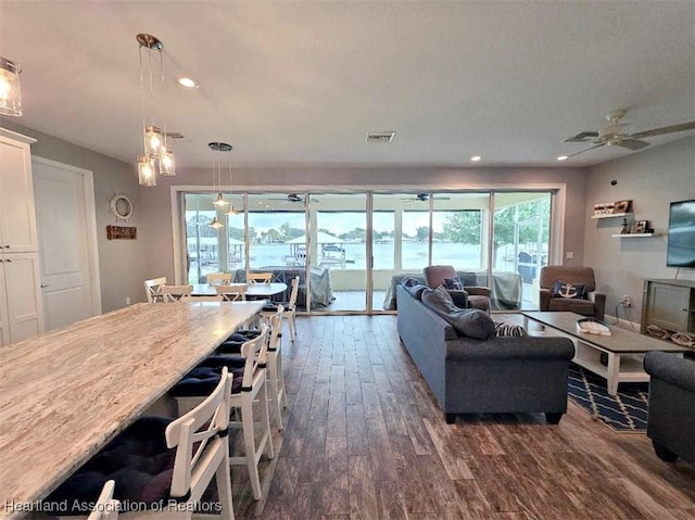 132 Red Water Pt, Lake Placid, FL 33852 - living room with dark wood-style flooring, a ceiling fan, and recessed lighting
