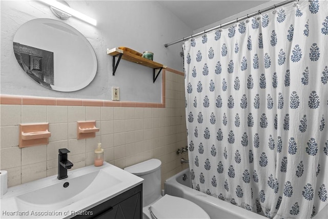 full bathroom with vanity, shower / bath combination with curtain, toilet, tile walls, and tasteful backsplash