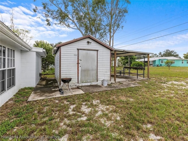 view of outdoor structure featuring a yard