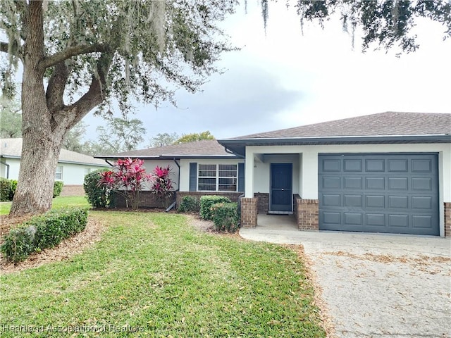 ranch-style home featuring a garage and a front lawn