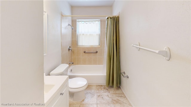 full bathroom featuring vanity, toilet, and shower / bath combo with shower curtain