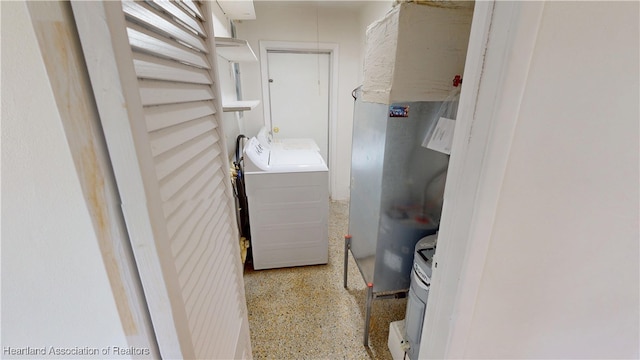 laundry area featuring washer and clothes dryer and laundry area