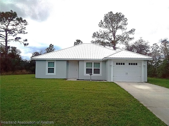 ranch-style home featuring a garage, a front lawn, driveway, and stucco siding