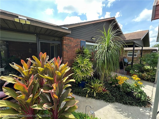 4212 Elson Ave, Sebring, FL 33875 - view of property exterior with brick siding