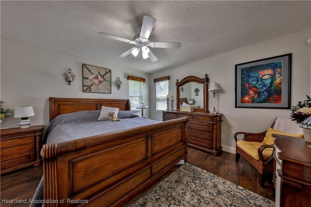 4212 Elson Ave, Sebring, FL 33875 - bedroom with dark wood-style flooring, a textured ceiling, and ceiling fan