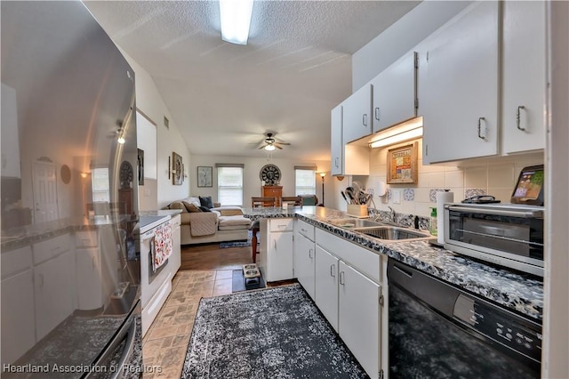 4212 Elson Ave, Sebring, FL 33875 - kitchen with black dishwasher, a ceiling fan, a peninsula, white range with electric cooktop, and backsplash