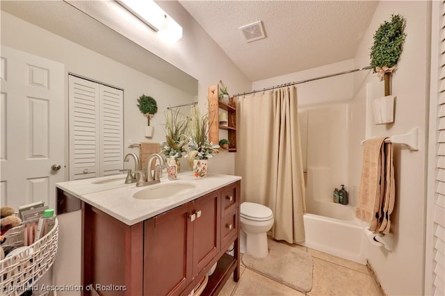 4212 Elson Ave, Sebring, FL 33875 - bathroom featuring vanity, a textured ceiling, shower / bath combo, and tile patterned floors